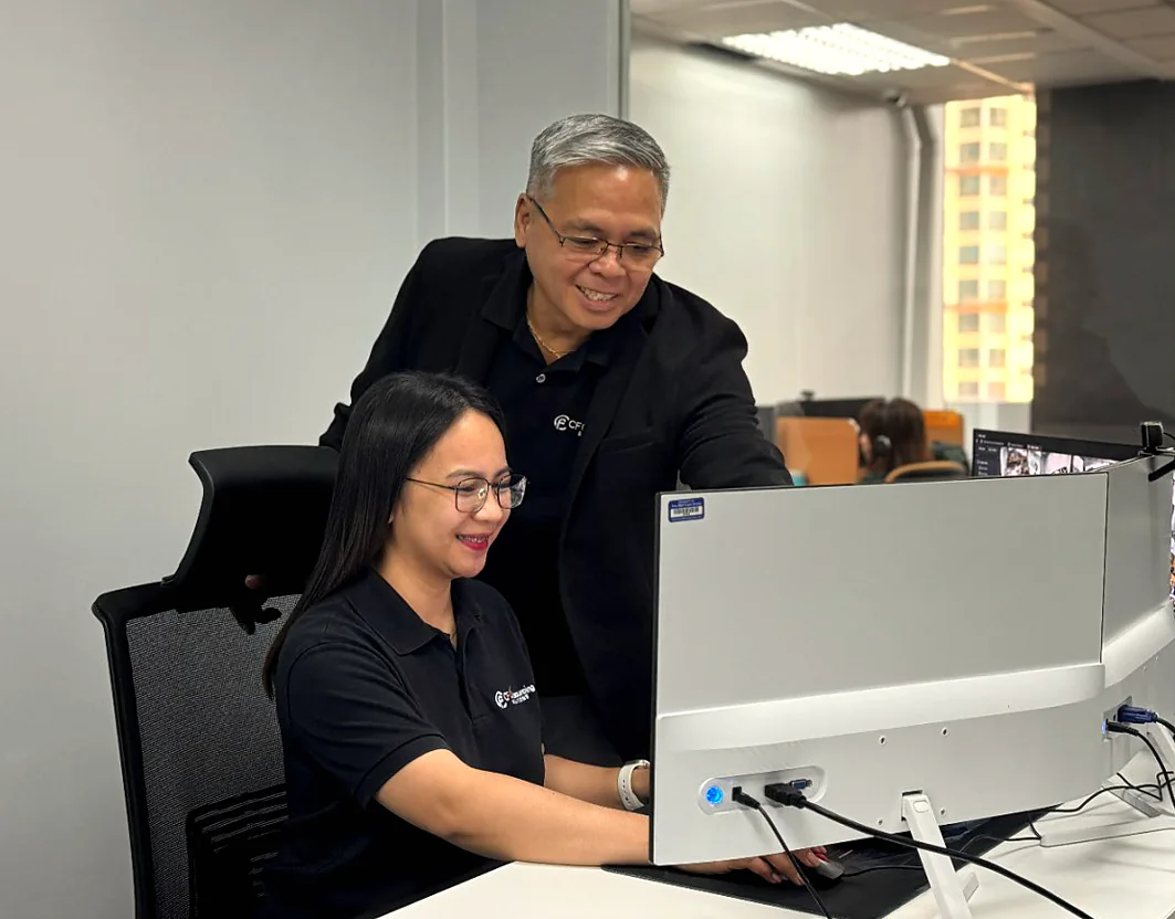 CF team members meeting inside the Philippines operations office